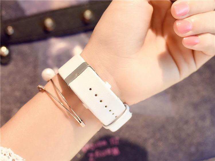 Damski minimalistyczny zegarek z geometrycznym motywem