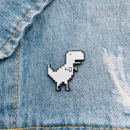 Przypinka - pikselowy dinozaur